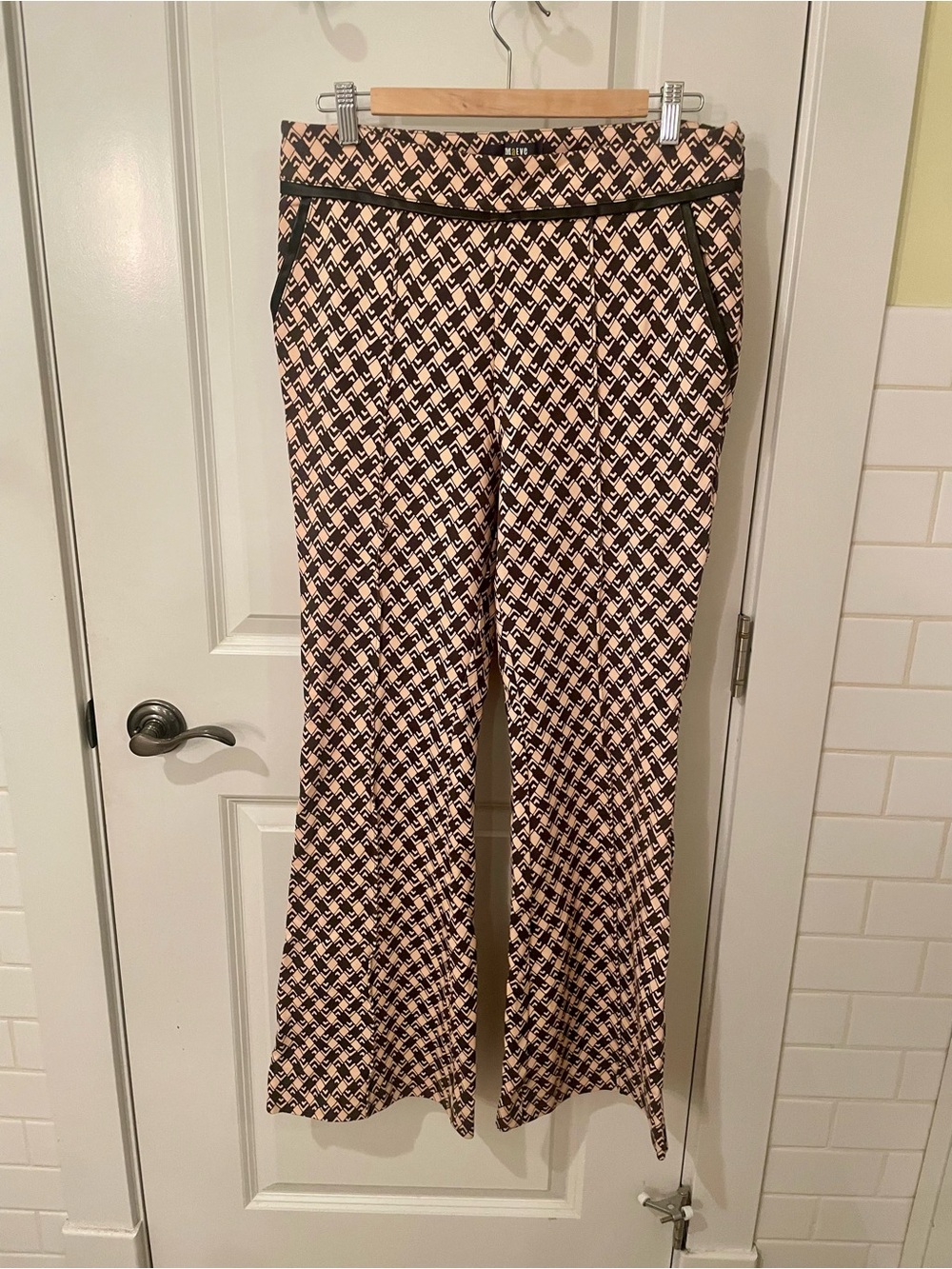 Anthropologie black and cream flare pants